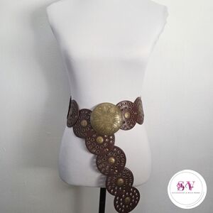 Brown and gold belt with brass color buckle